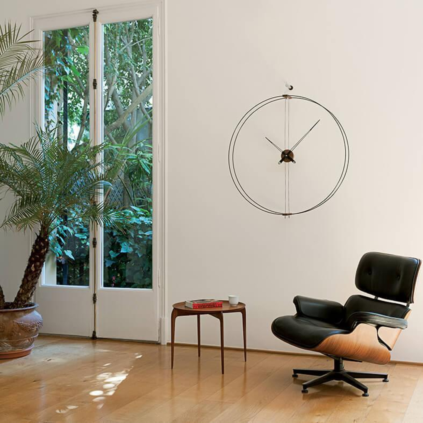 Nomon barcelona wall clock with black structure and inserts in walnut wood buy now on shopdecor 2 v1699246061