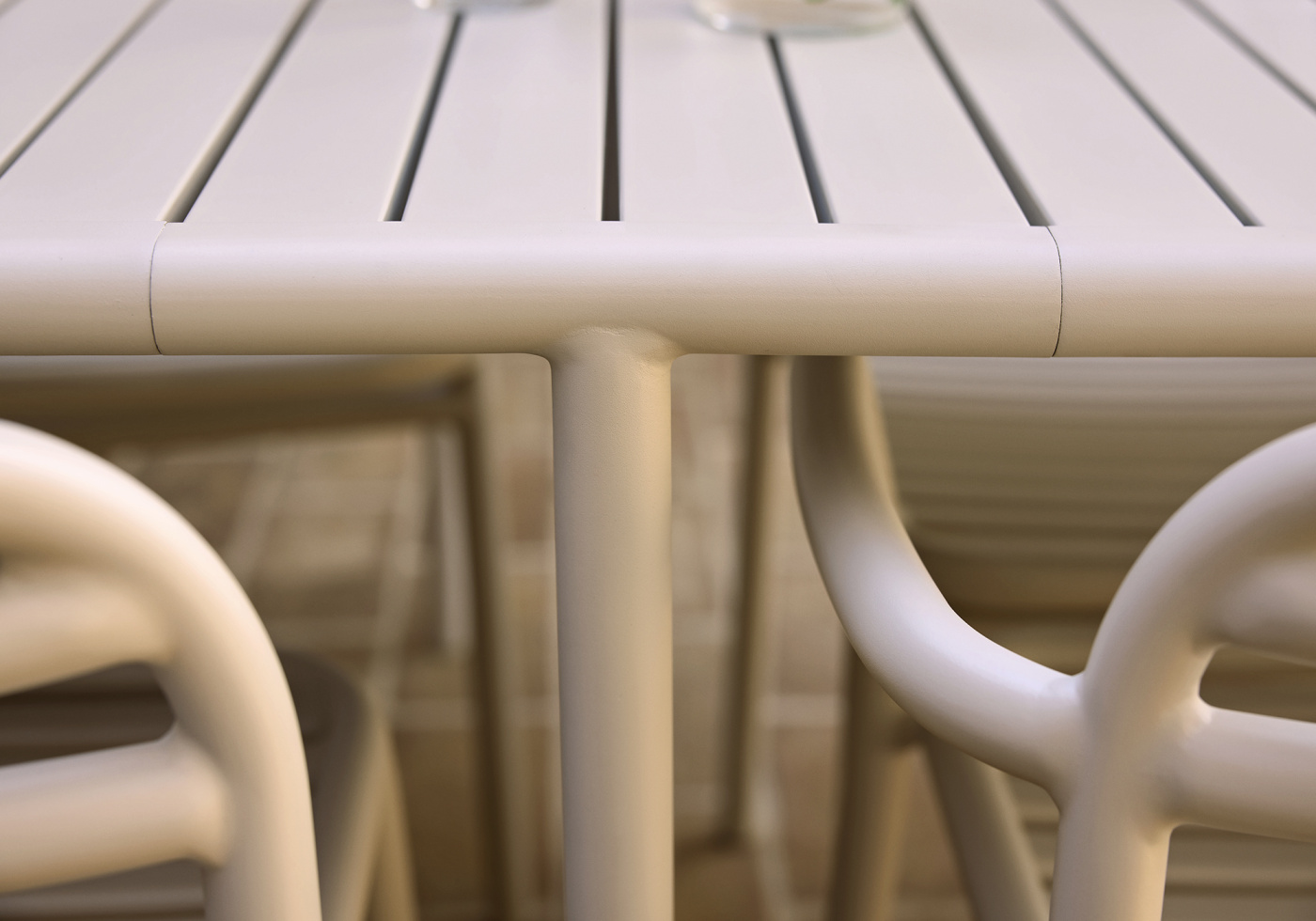 Cane line bliss outdoor dining table bliss dining chairs desert red