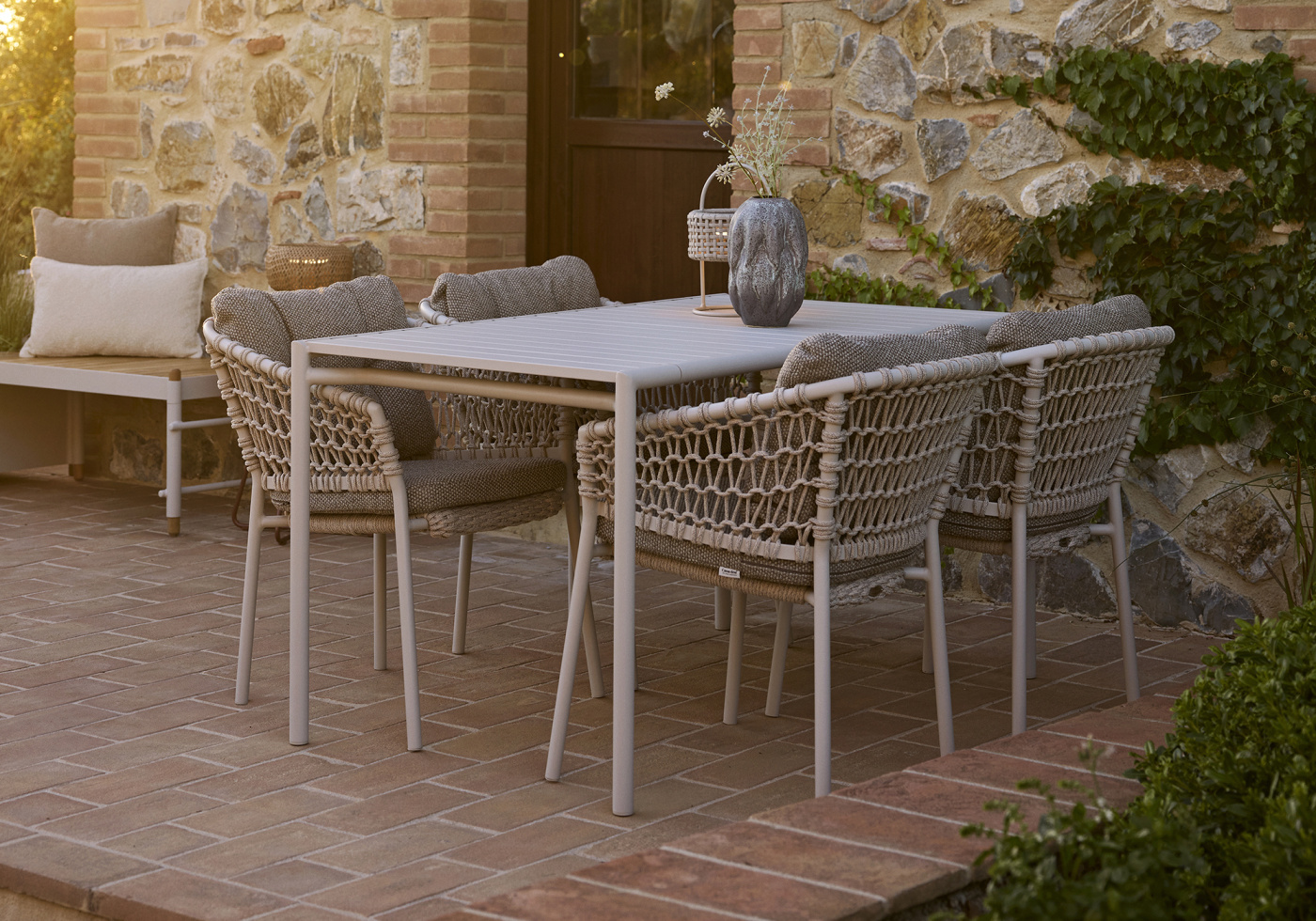 Cane line bliss outdoor dining table bliss dining chairs desert red